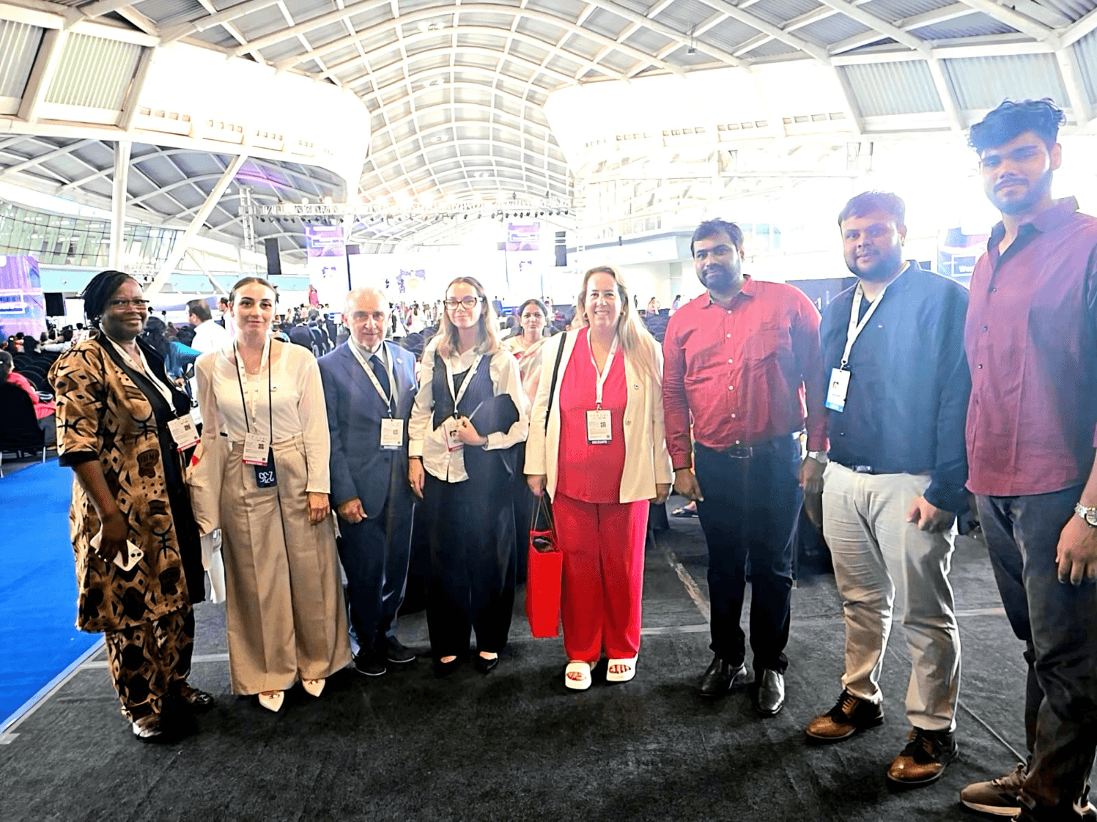 a group of people posing for a photo at an event
